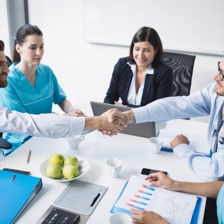 doctors-shaking-hands-with-each-other_107420-84801