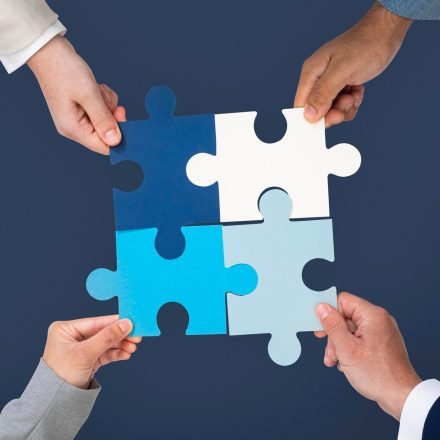 hands-holding-puzzle-business-problem-solving-concept_53876-129544